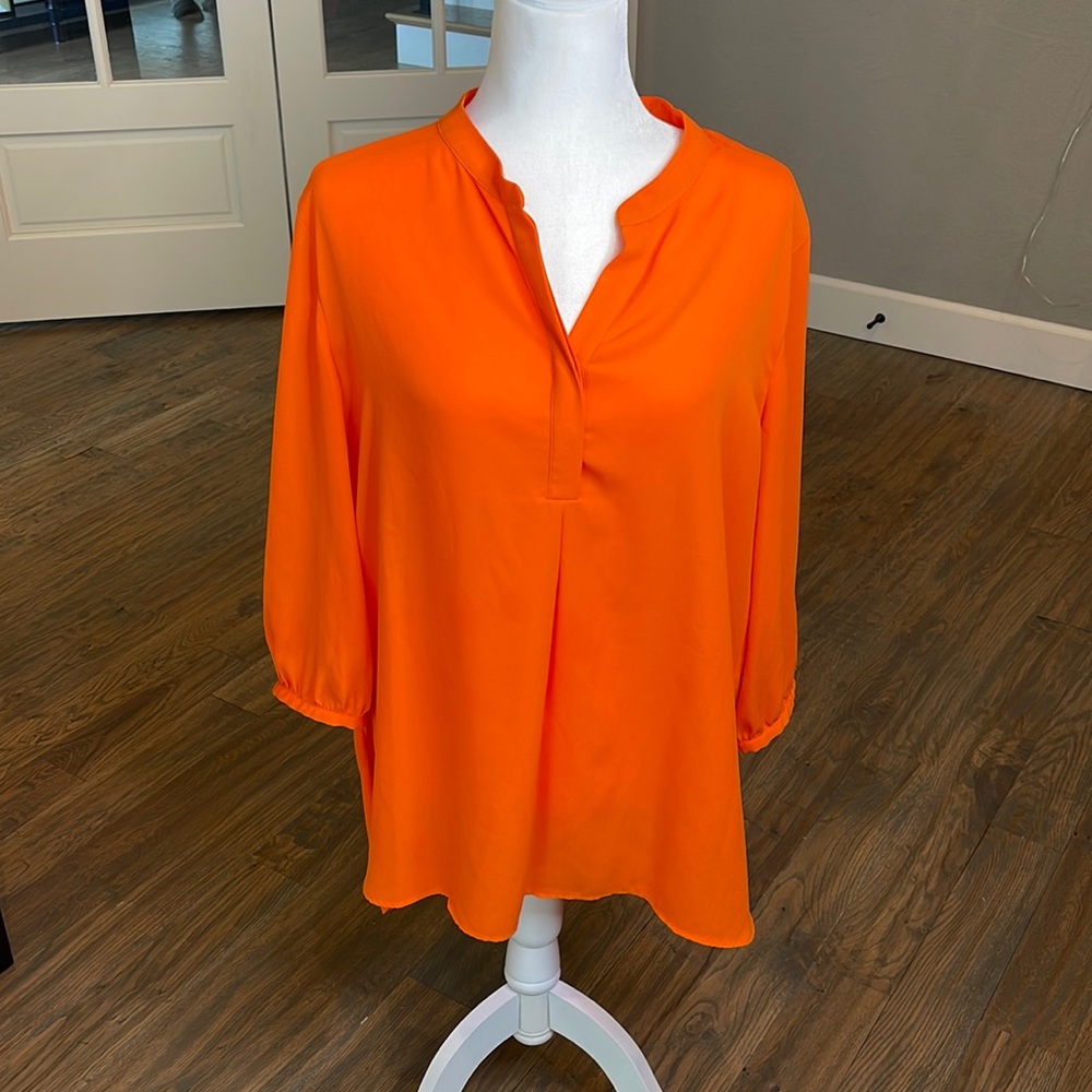 Size 16. Peter Nygard.